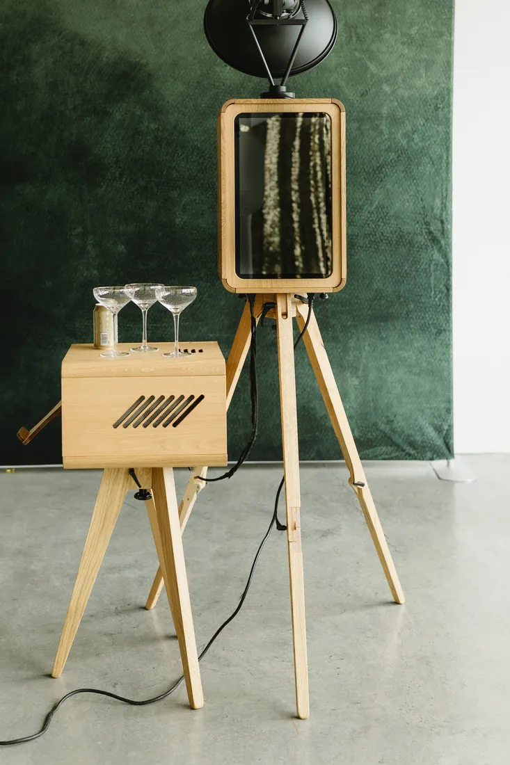 Vintage wood photo booth setup